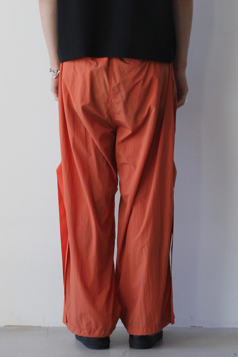 RECYCLING NYLON PARACHUTE PANTS / ORANGE [20%OFF]