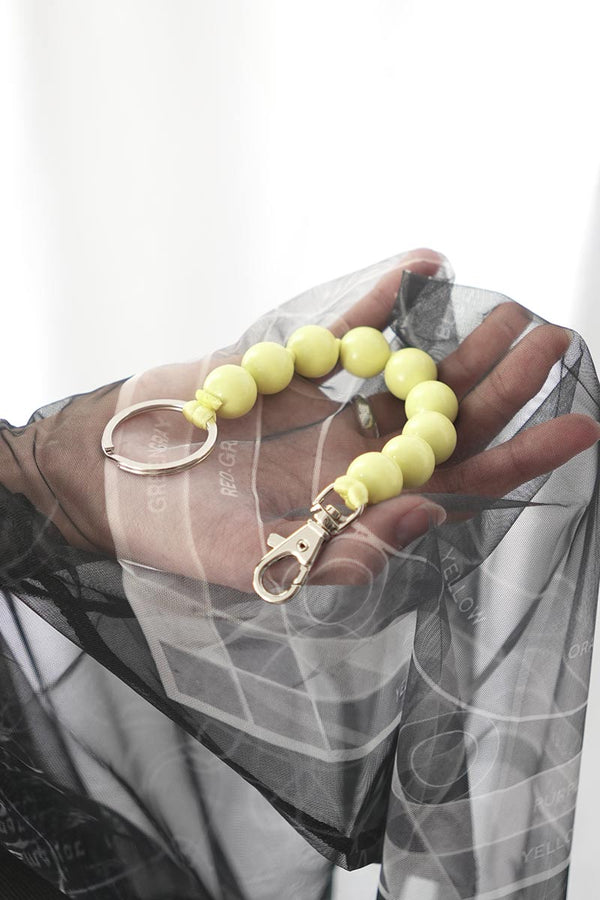DICKE PERLEN SHORT KEYHOLDER / PASTEL YELLOW
